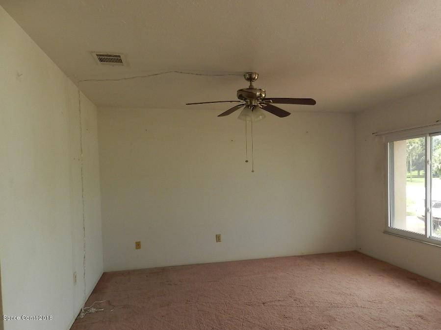 1095 Riviera Drive Northeast Palm Bay, FL 32905 - Photo 3 of 19 Living Room