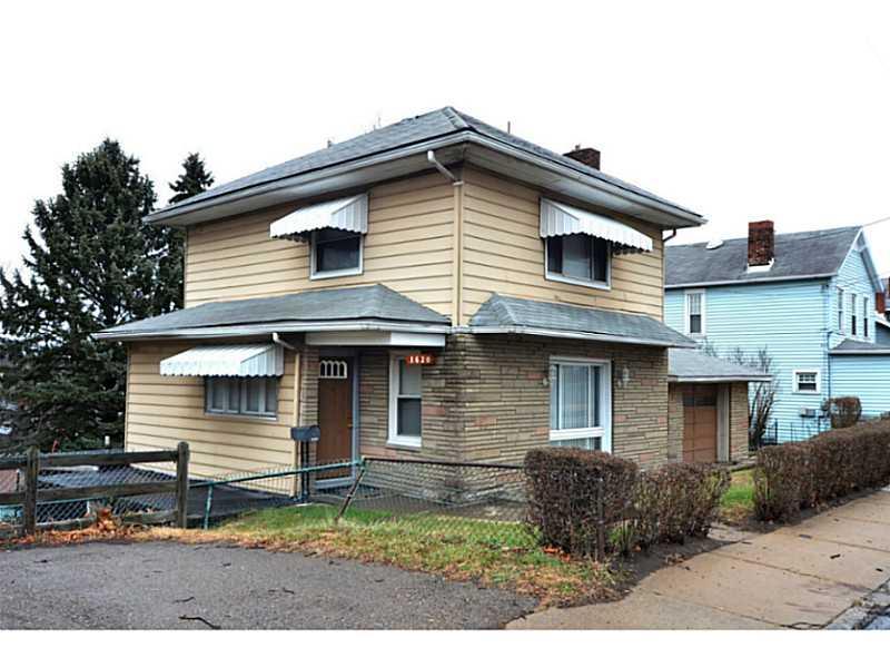 1620 Chartiers Avenue McKees Rocks, PA 15136 - Photo 2 of 25 Exterior Front. integral garage and additional off-street parking...