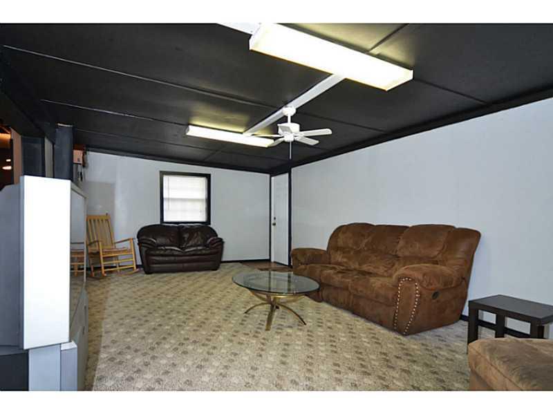 1620 Chartiers Avenue McKees Rocks, PA 15136 - Photo 23 of 25 Basement/Game Room. Access to the backyard through the home...