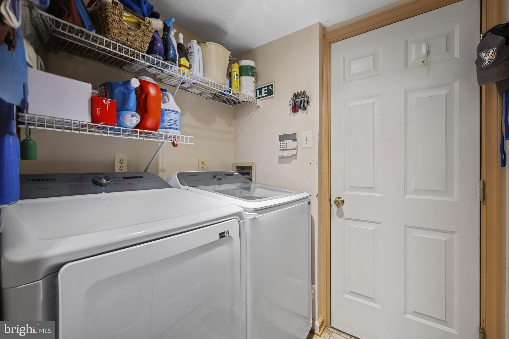 5 Wincrest Court Baltimore, MD 21208 - Photo 14 of 30 a utility room with dryer and washer