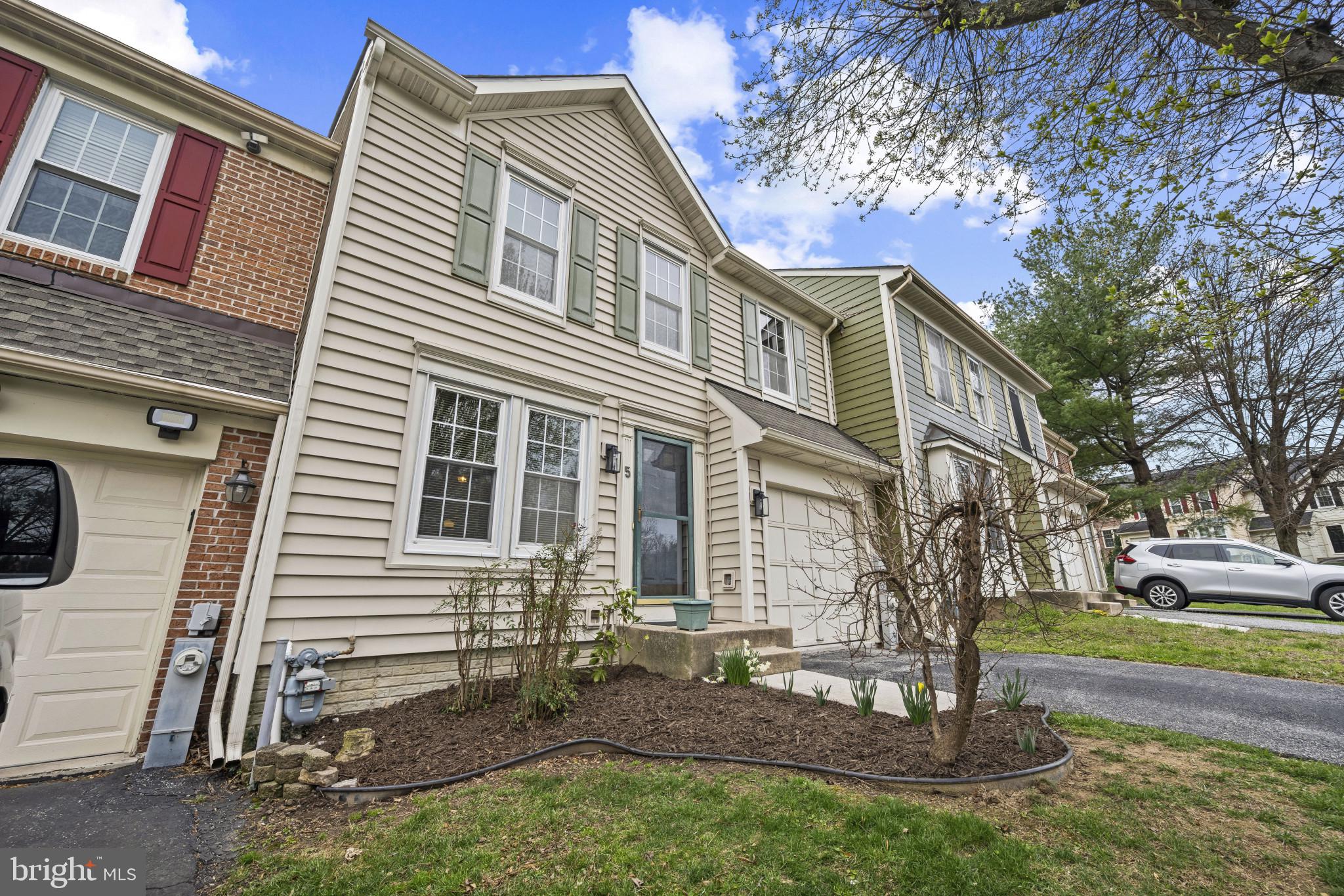 5 Wincrest Court Baltimore, MD 21208 - Photo 2 of 30 a front view of a house with garden