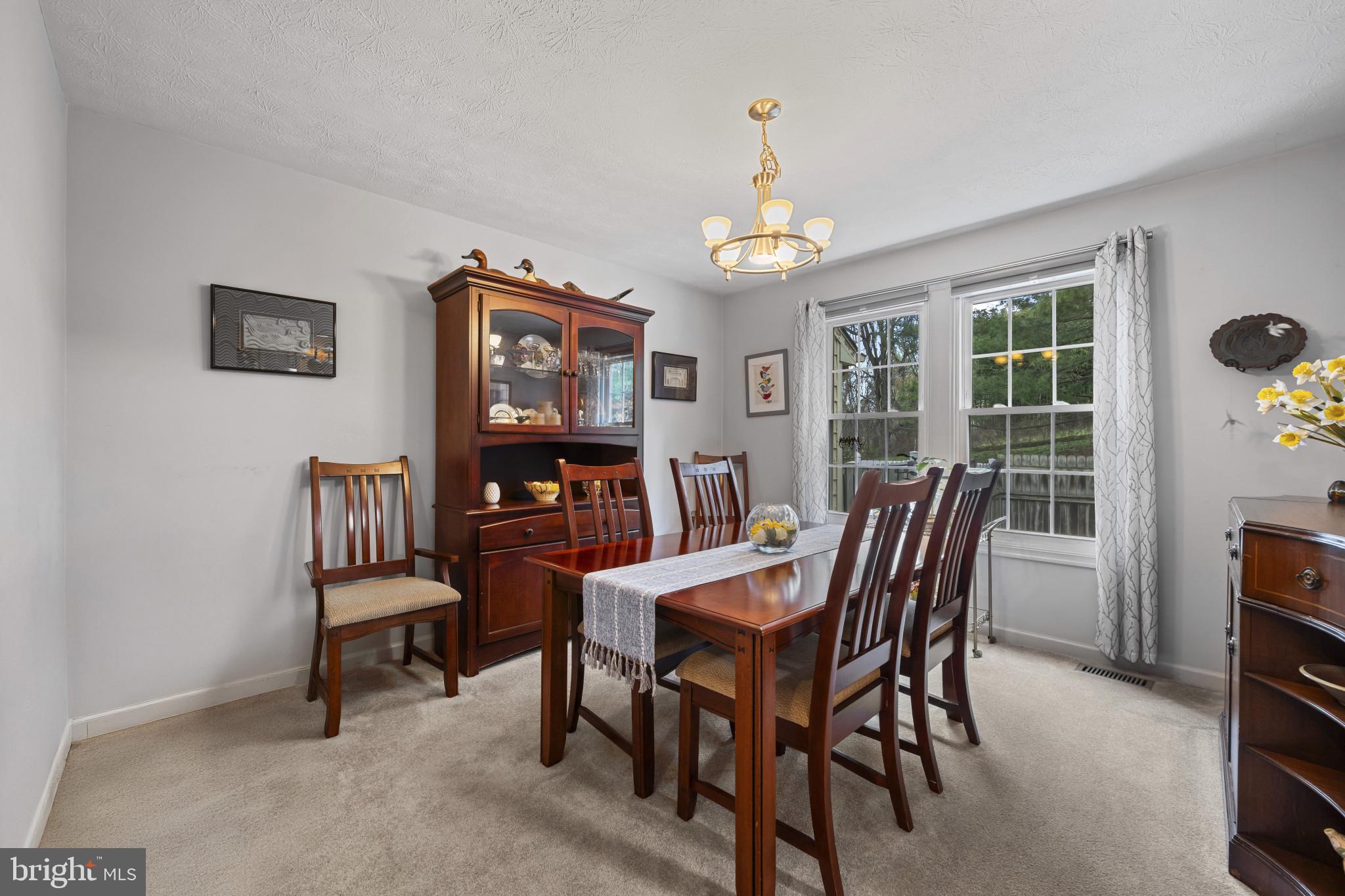 5 Wincrest Court Baltimore, MD 21208 - Photo 7 of 30 a view of a dining room with furniture window and wooden floor