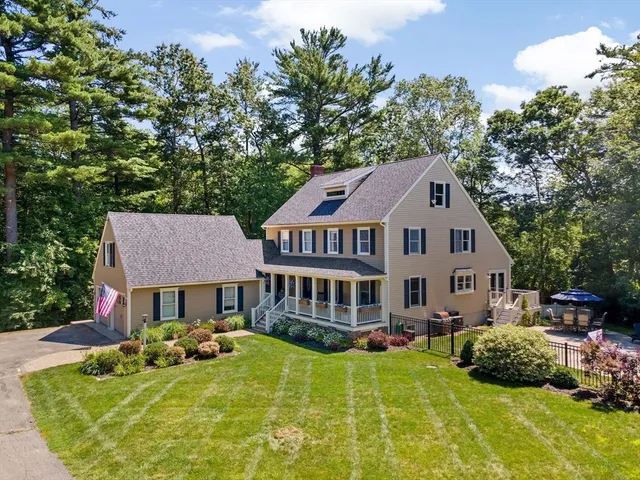 a view of a house with a swimming pool