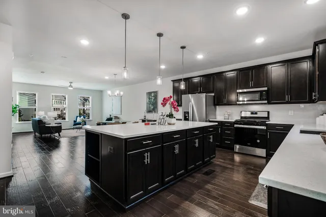 a kitchen with a stove and a sink