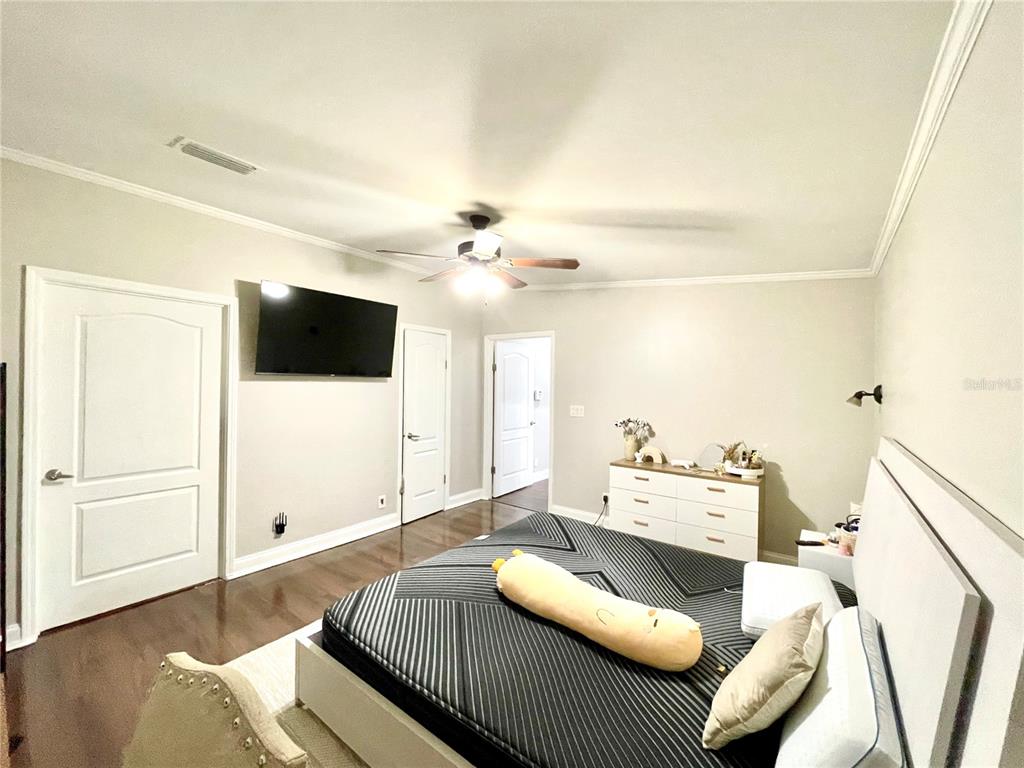 35495 Singletary Road Myakka City, FL 34251 - Photo 14 of 74 a living room with furniture and a flat screen tv