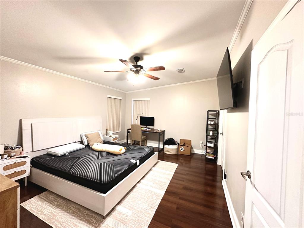 35495 Singletary Road Myakka City, FL 34251 - Photo 16 of 74 a living room with furniture and a flat screen tv