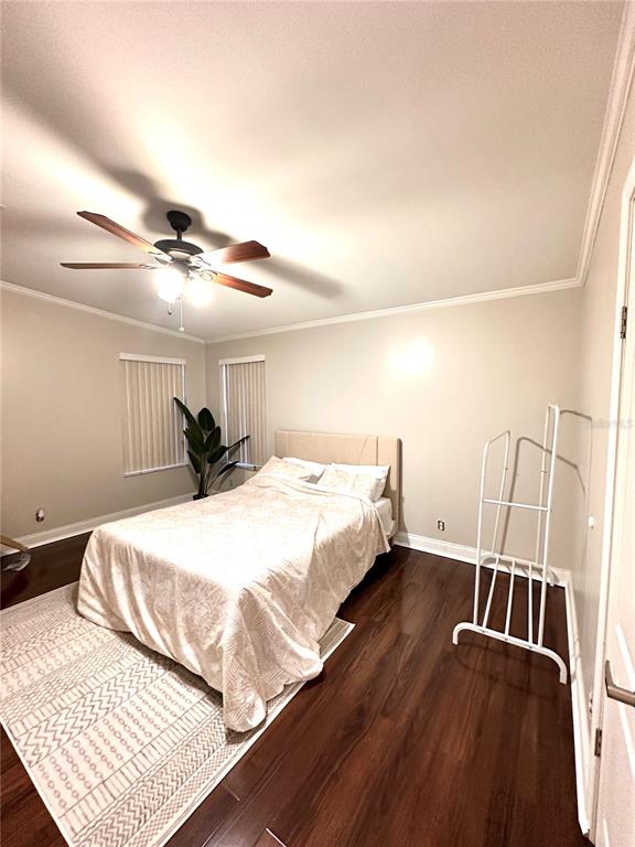 35495 Singletary Road Myakka City, FL 34251 - Photo 19 of 74 a bed room with a bed and a rug