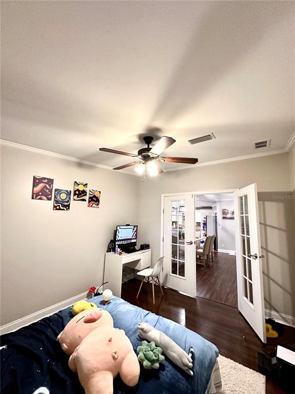 35495 Singletary Road Myakka City, FL 34251 - Photo 20 of 74 a living room with furniture and wooden floor