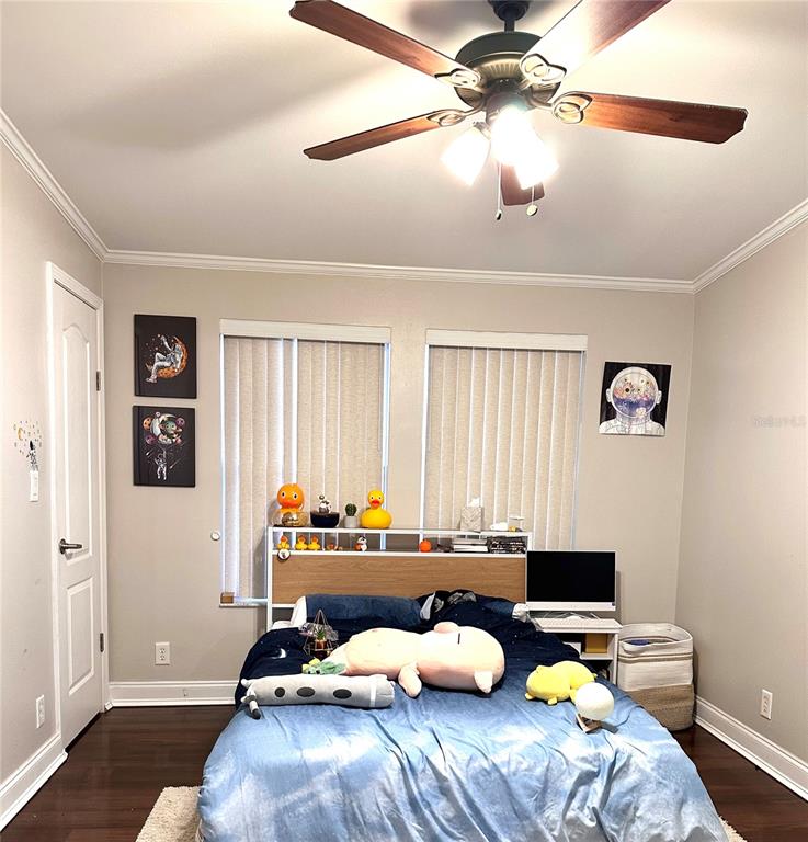 35495 Singletary Road Myakka City, FL 34251 - Photo 21 of 74 a bedroom with bed and a window