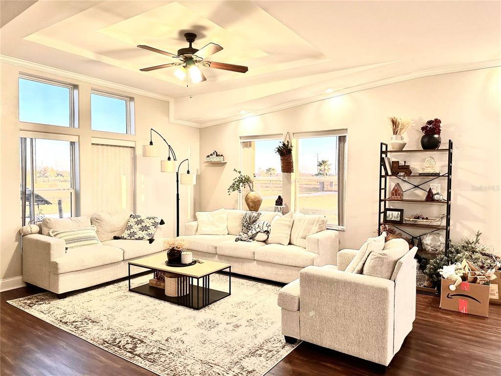 35495 Singletary Road Myakka City, FL 34251 - Photo 22 of 74 a living room with furniture and a large window
