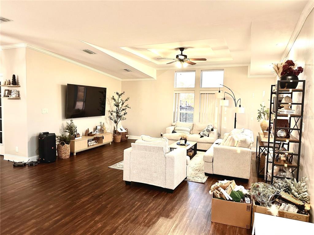 35495 Singletary Road Myakka City, FL 34251 - Photo 24 of 74 a living room with furniture and a flat screen tv