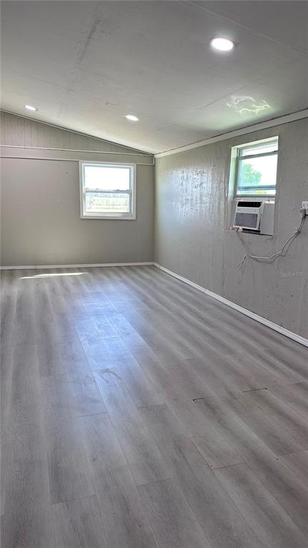 35495 Singletary Road Myakka City, FL 34251 - Photo 32 of 74 an empty room with windows and mirror