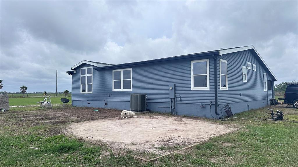 35495 Singletary Road Myakka City, FL 34251 - Photo 41 of 74 a view of a house with a backyard
