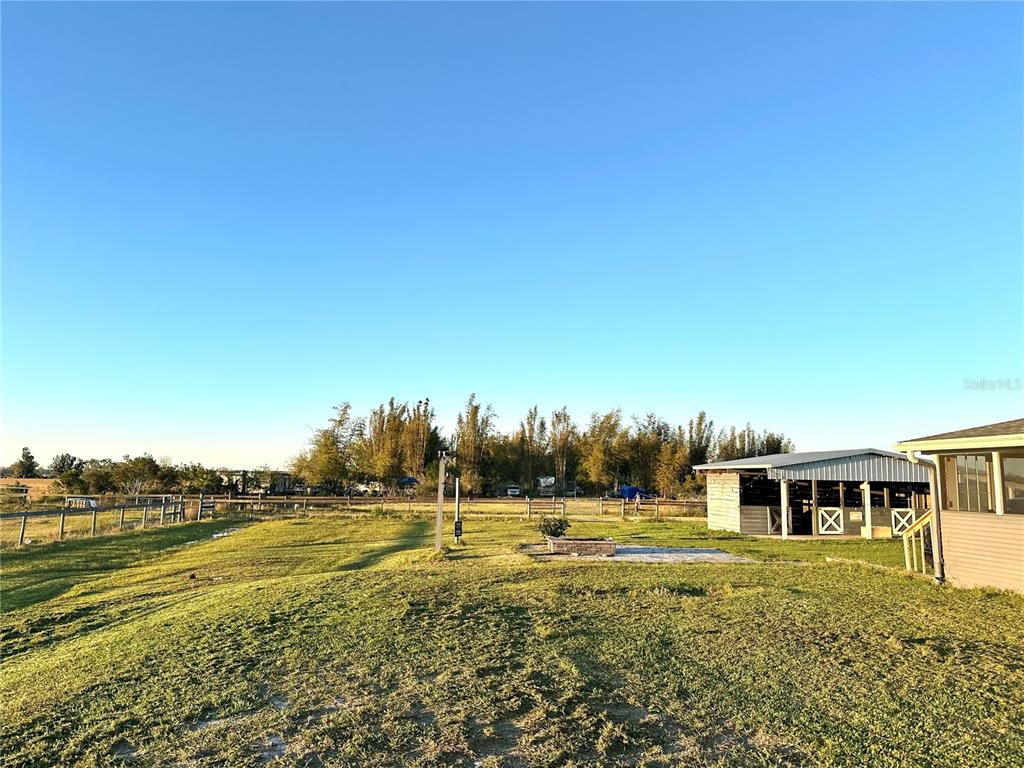 35495 Singletary Road Myakka City, FL 34251 - Photo 43 of 74 a view of a house with a yard