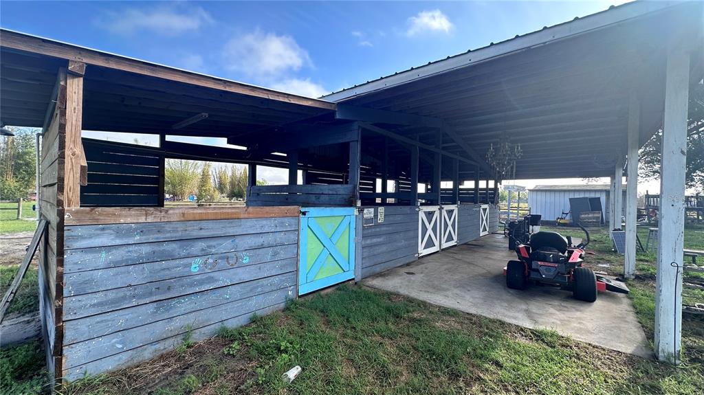 35495 Singletary Road Myakka City, FL 34251 - Photo 53 of 74 a view of a car garage