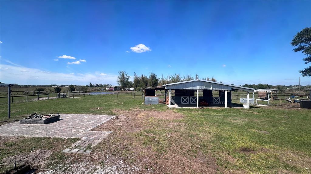35495 Singletary Road Myakka City, FL 34251 - Photo 58 of 74 a view of a house with a yard