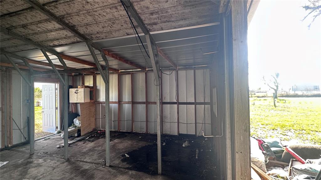 35495 Singletary Road Myakka City, FL 34251 - Photo 64 of 74 a view of a room with wooden floor and windows