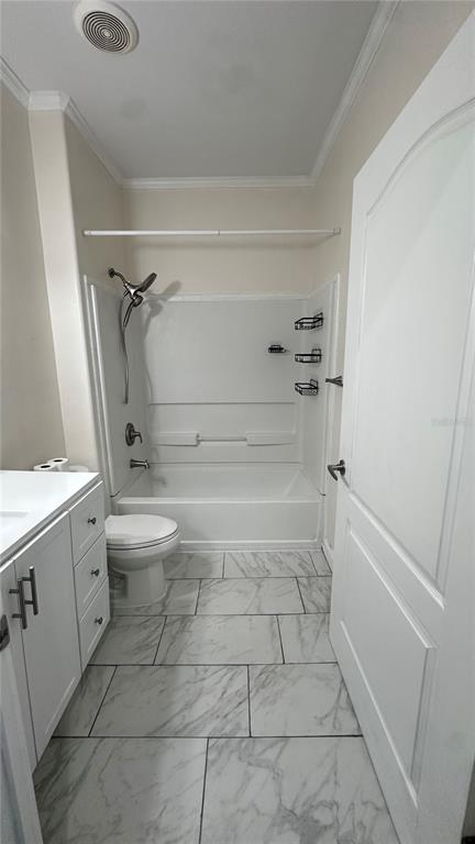 35495 Singletary Road Myakka City, FL 34251 - Photo 70 of 74 a bathroom with a granite countertop bathtub toilet and sink