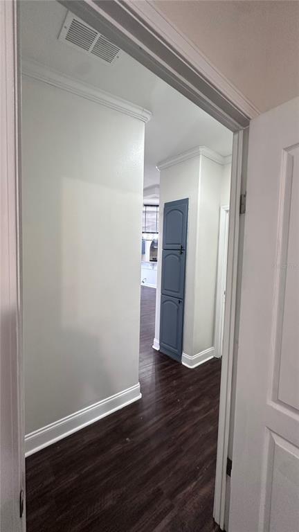 35495 Singletary Road Myakka City, FL 34251 - Photo 71 of 74 a view of a hallway with wooden floor