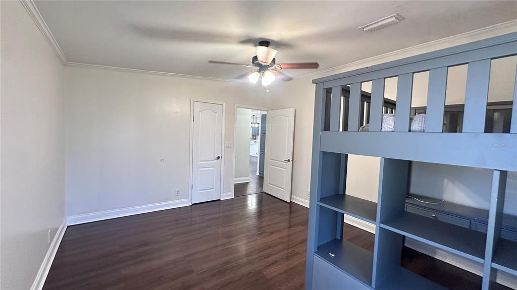 35495 Singletary Road Myakka City, FL 34251 - Photo 74 of 74 a view of an empty room with wooden floor and a window