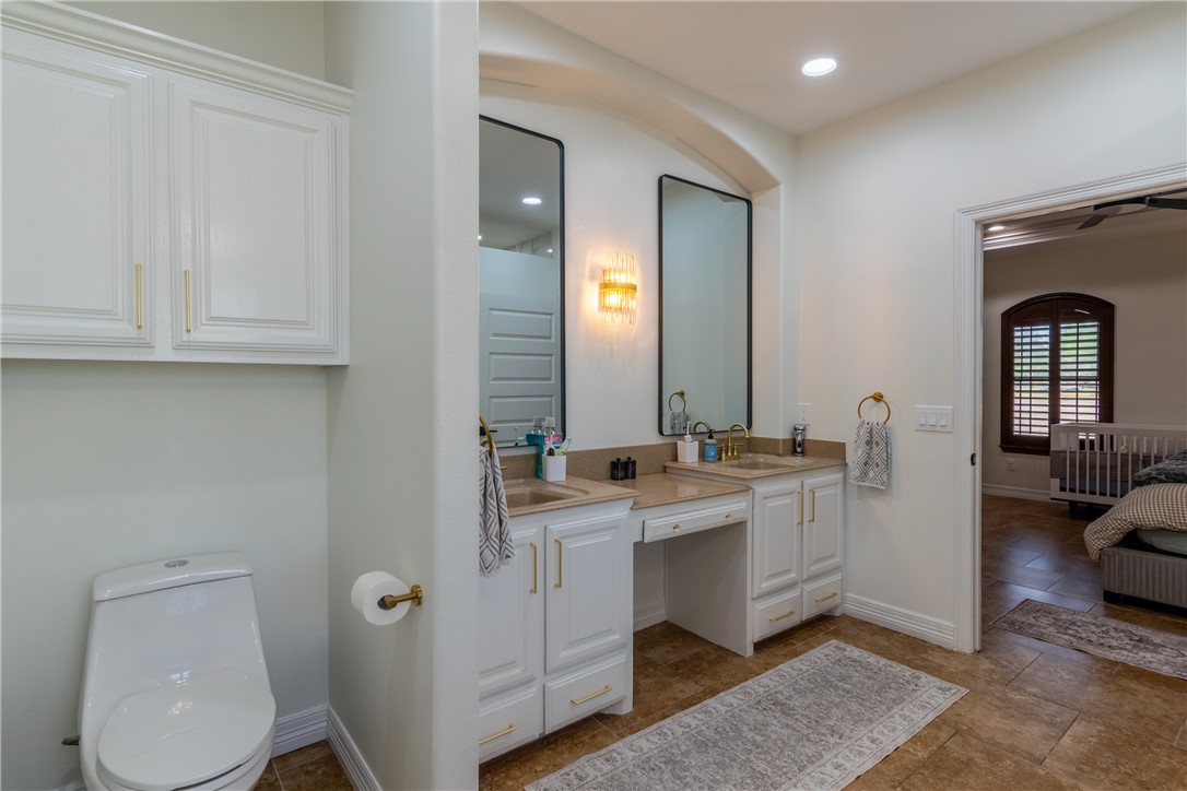 108 County Road 1601 Alice, TX 78332 - Photo 20 of 32 a view of bathroom with dual sinks
