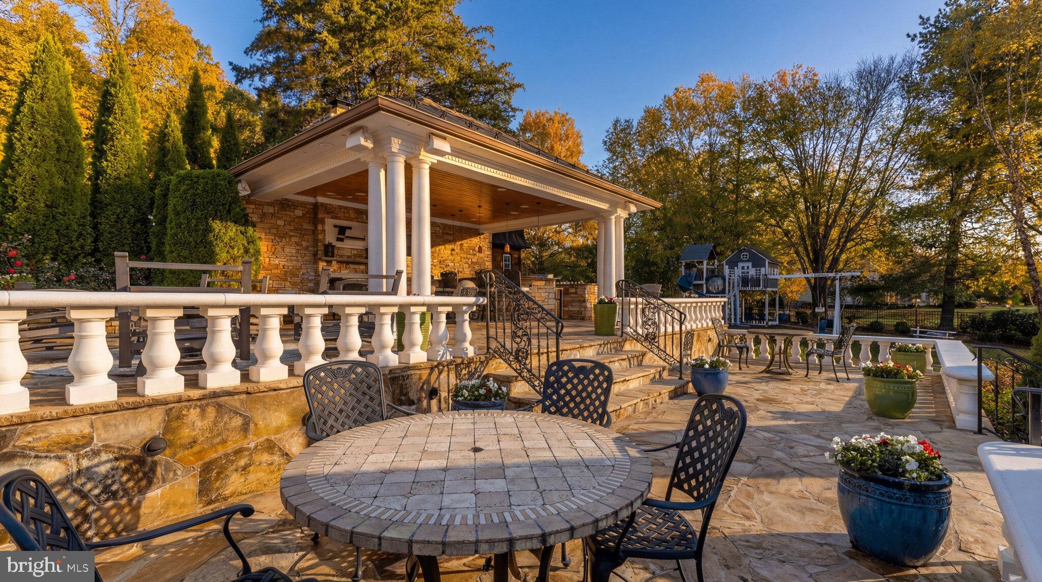 1521 Hunter Mill Road Vienna, VA 22182 - Photo 7 of 12 a view of a chairs and table in the patio
