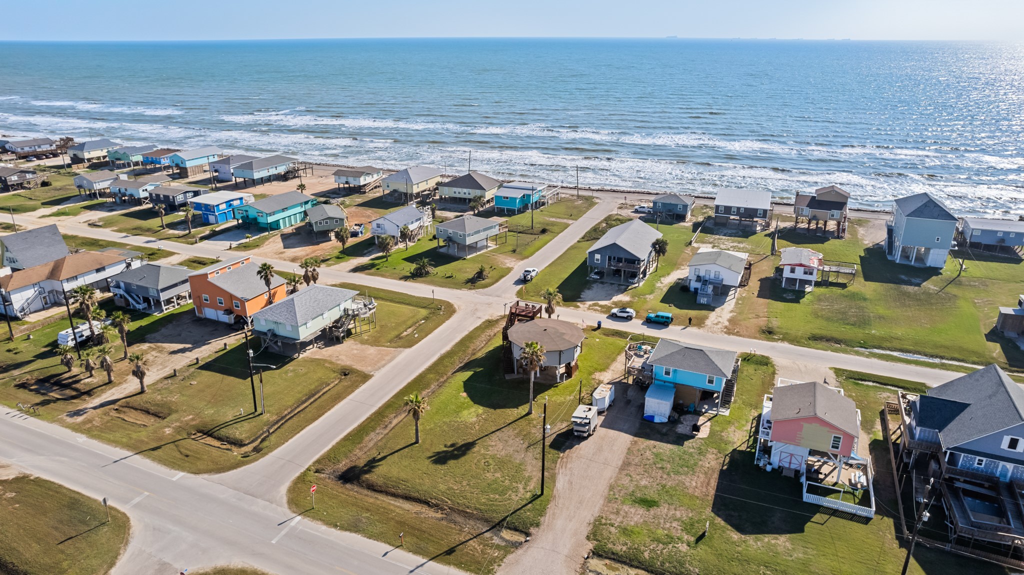702 Seashell Drive Surfside Beach, TX 77541 - Photo 38 of 40 Enjoy the beauty of coastal living with this prime location near the water, offering a balance of serene neighborhood charm and quick access to the beach and local amenities.