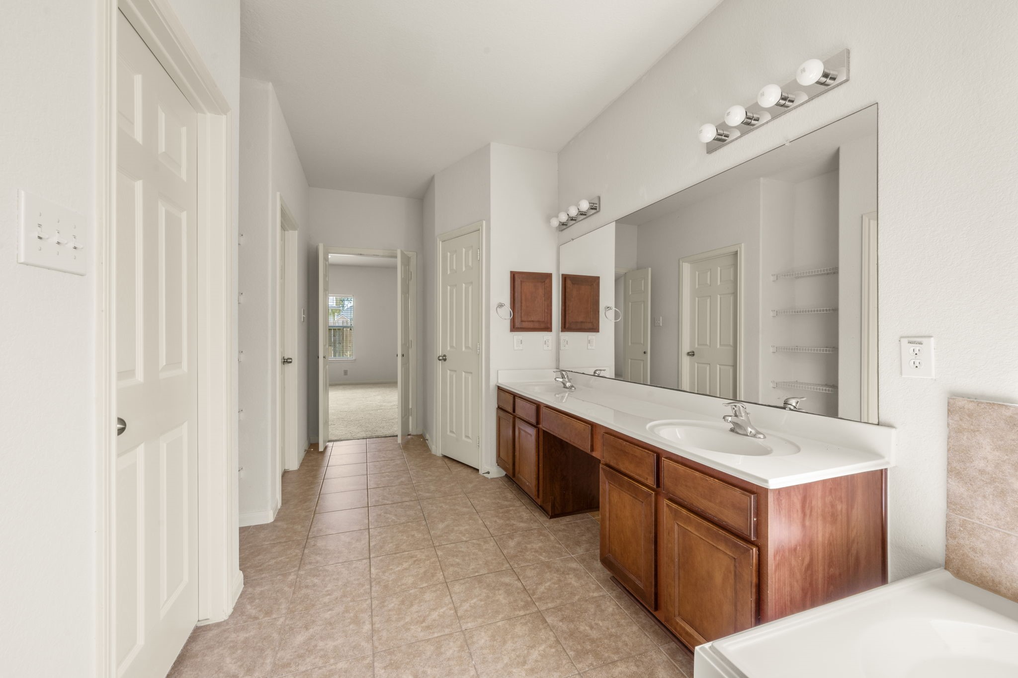 7803 Blue Lake Drive Rosenberg, TX 77469 - Photo 11 of 31 a large bathroom with a double vanity sink mirror and double