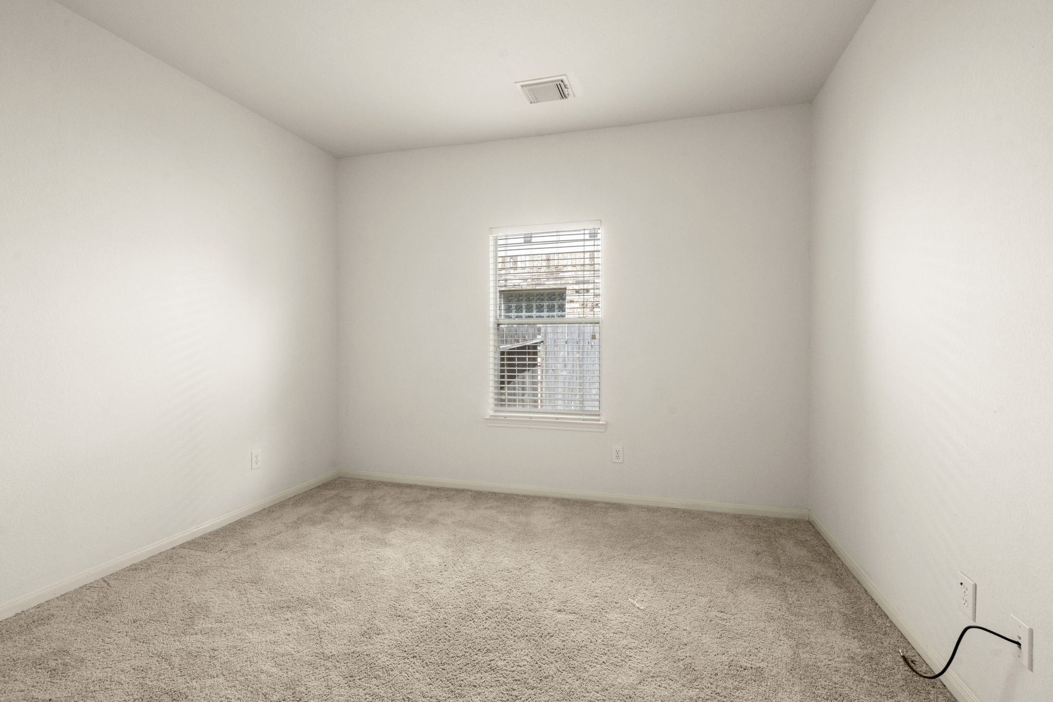 7803 Blue Lake Drive Rosenberg, TX 77469 - Photo 19 of 31 an empty room with a window