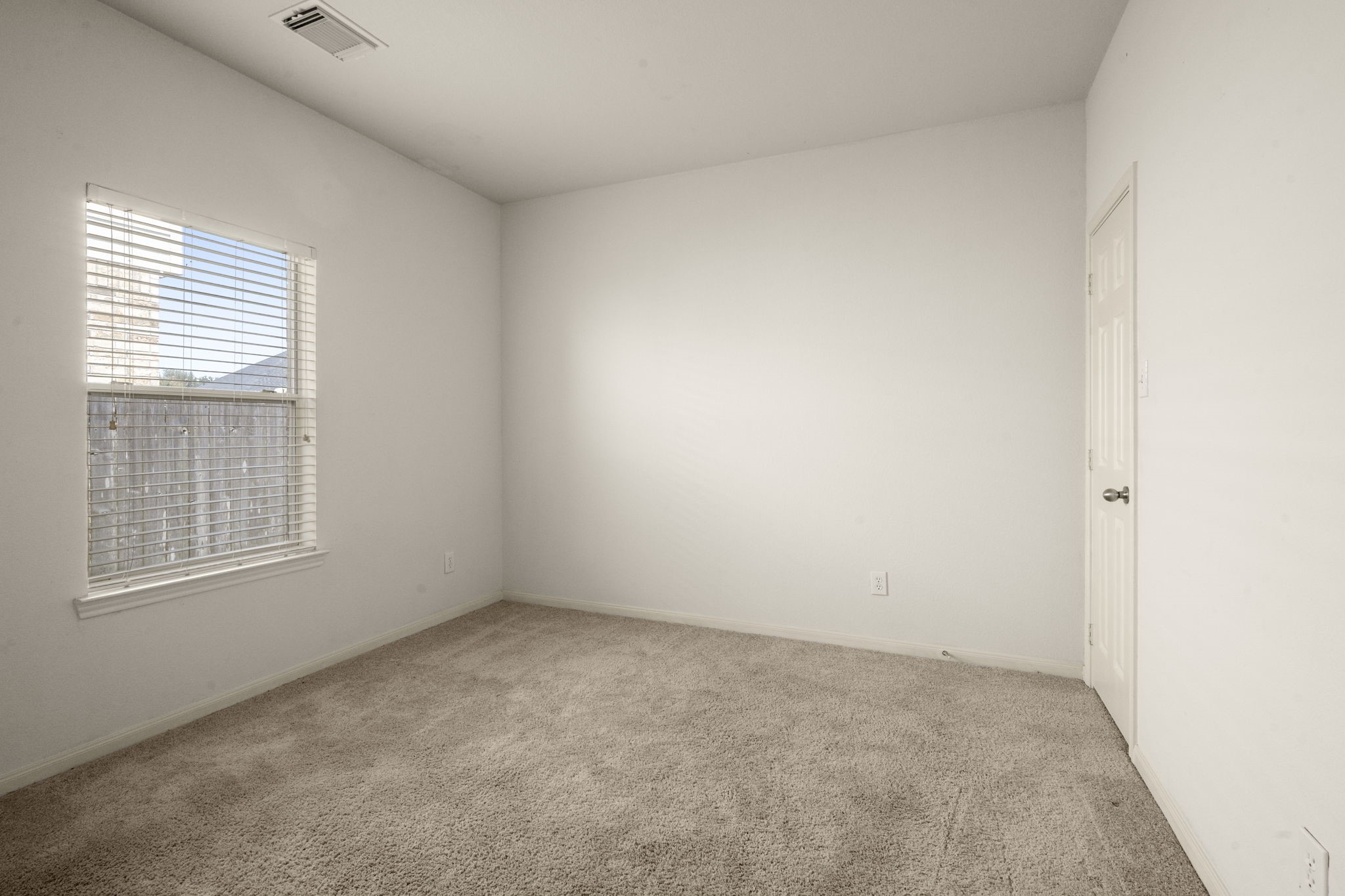 7803 Blue Lake Drive Rosenberg, TX 77469 - Photo 20 of 31 an empty room with a window