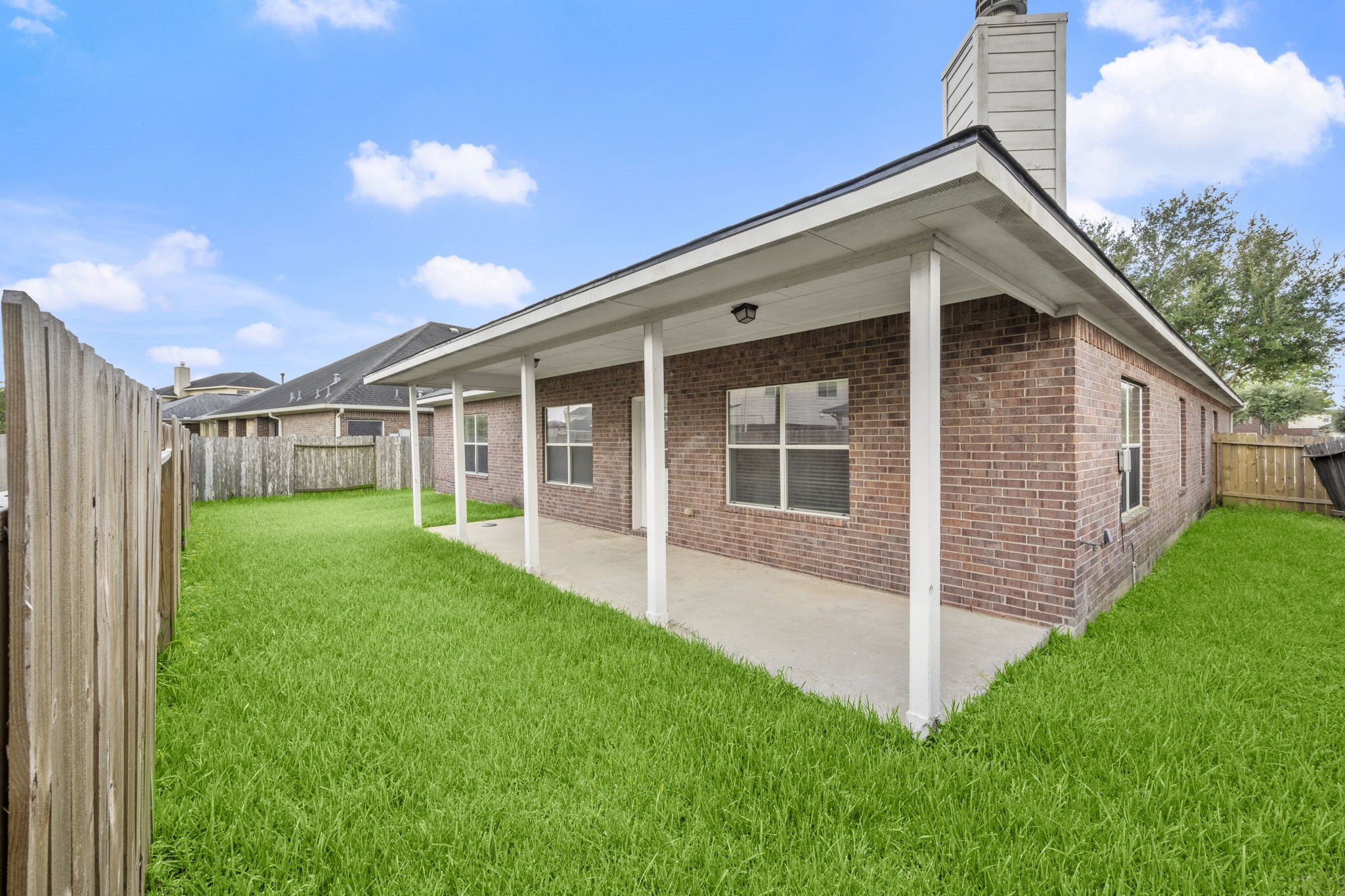 7803 Blue Lake Drive Rosenberg, TX 77469 - Photo 30 of 31 a view of a house with backyard