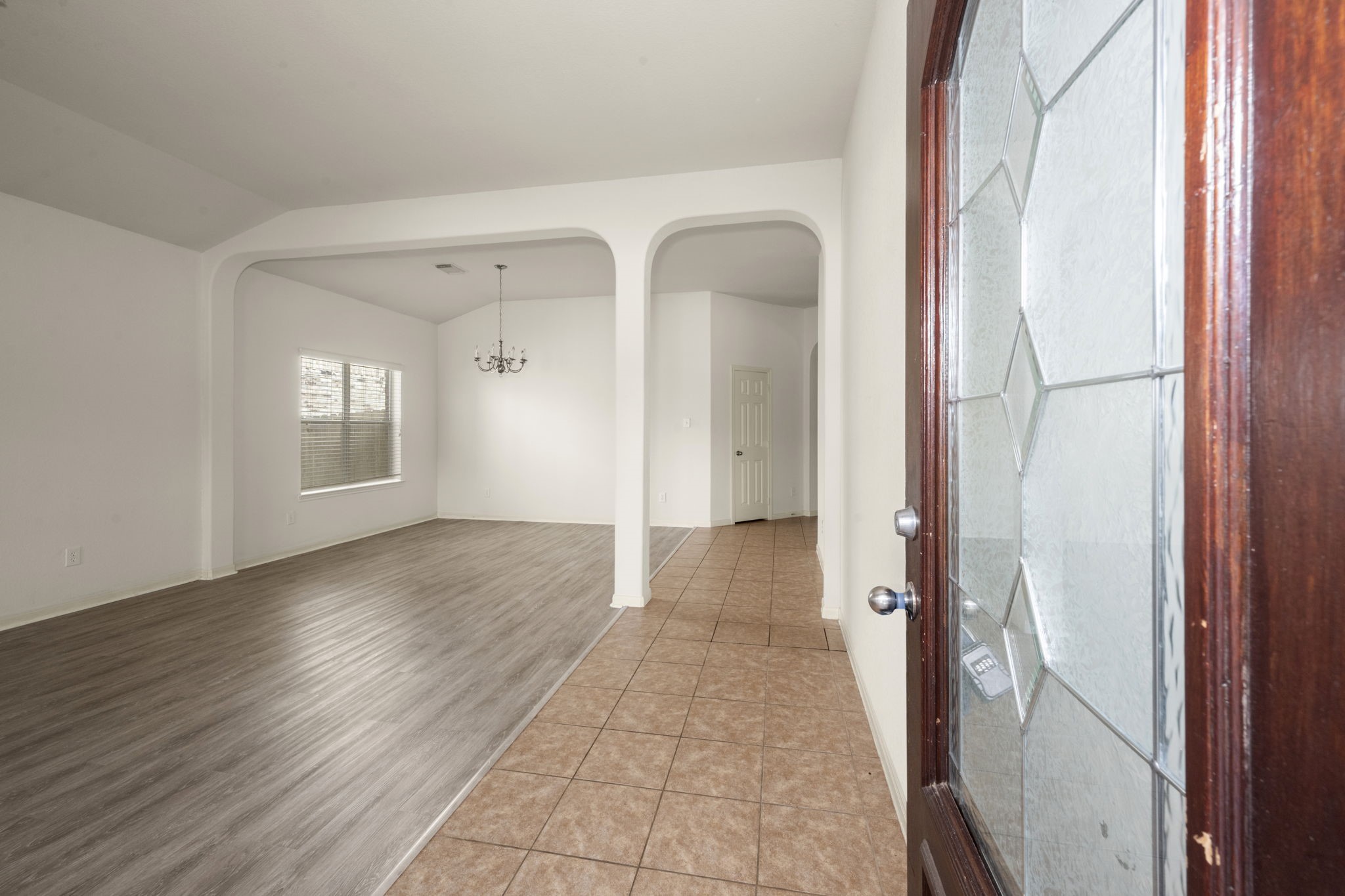 7803 Blue Lake Drive Rosenberg, TX 77469 - Photo 31 of 31 a view of empty room with wooden floor and fan