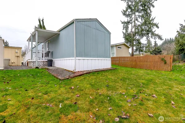 a view of a back yard of the house