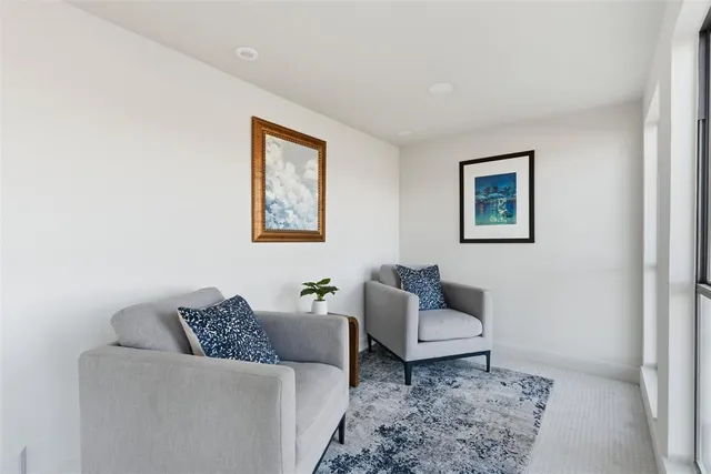 a living room with furniture and a couch