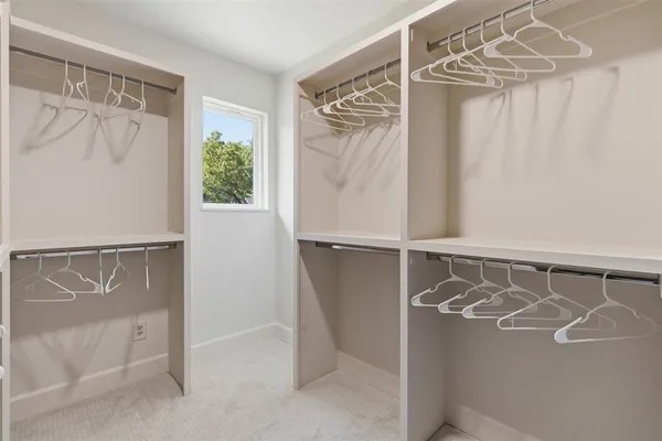 a view of walk in closet with window