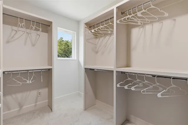 a view of walk in closet with window