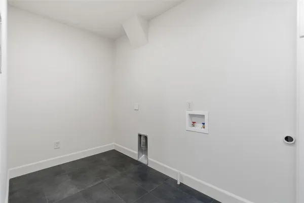 an empty room with a workbench