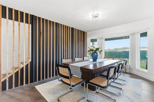 a view of a livingroom with furniture and window