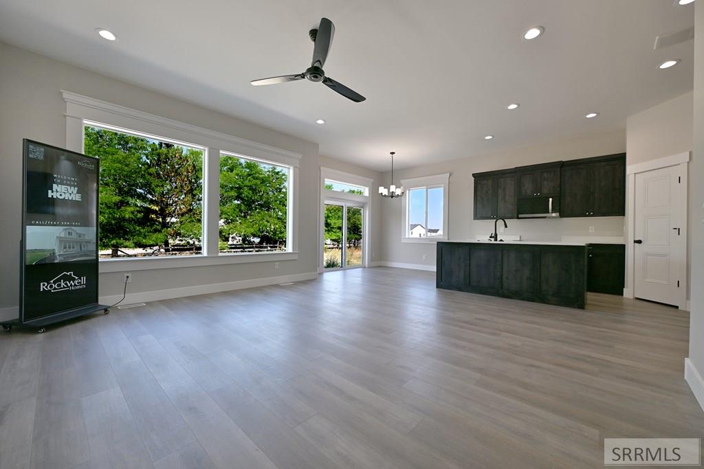 4937 Big River Road Idaho Falls, ID 83401 - Photo 3 of 18 Great Room to Kitchen/Dining Area