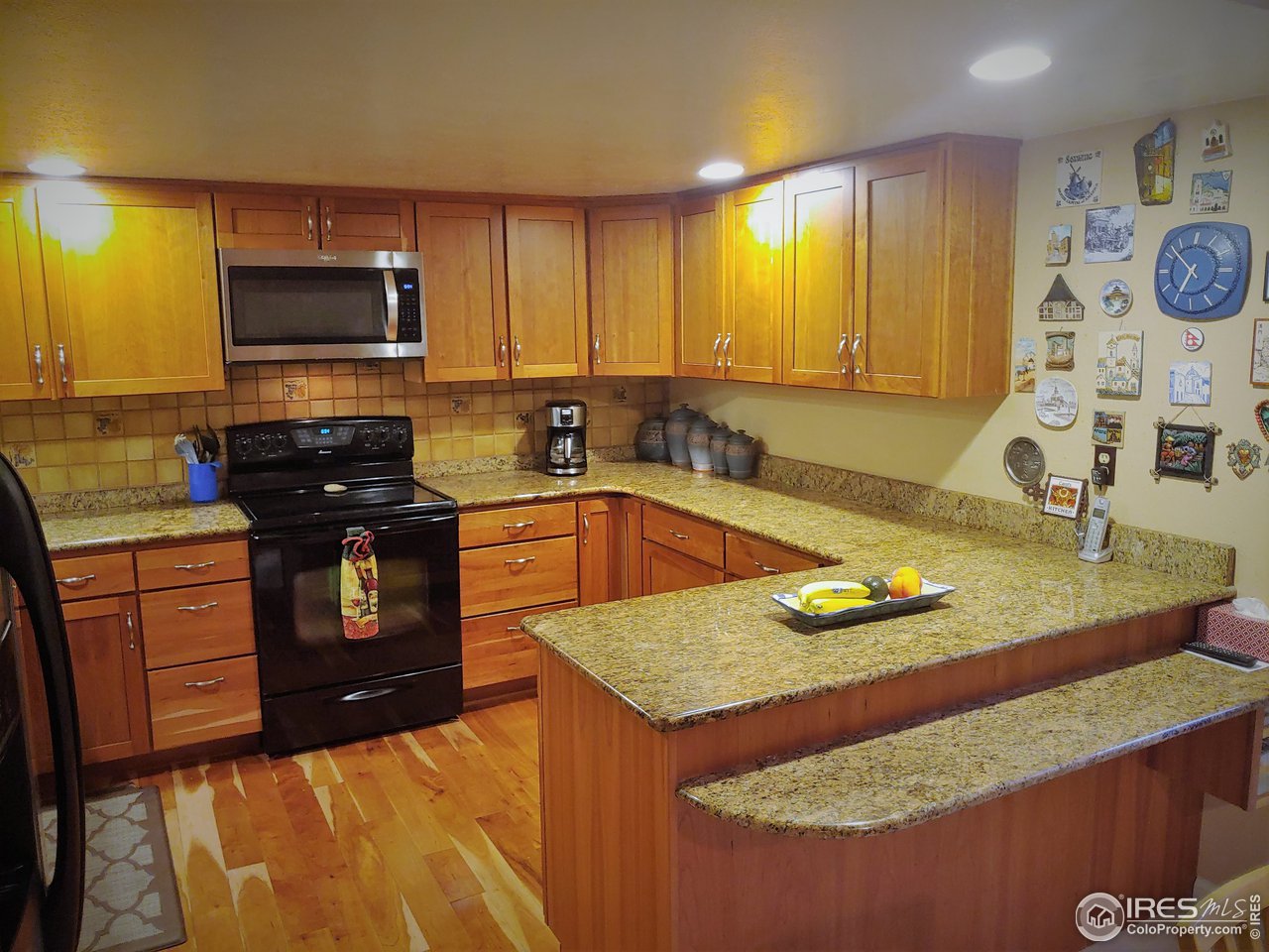 4471 Rustic Trail Boulder, CO 80301 - Photo 5 of 31 Granite Counters and Cherry Cabinets!