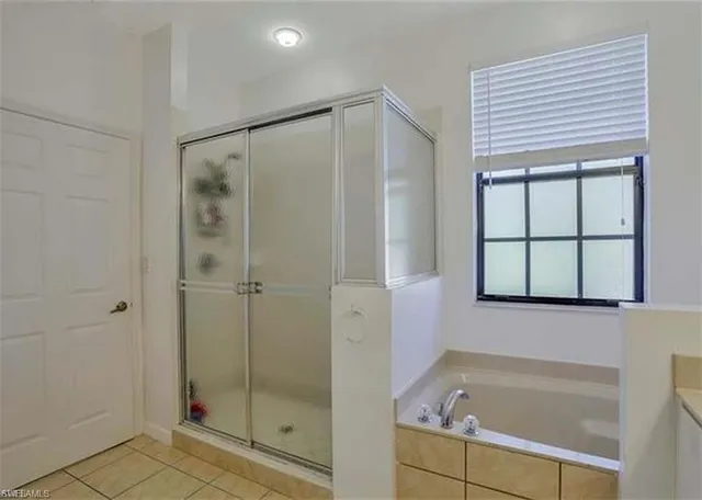 a view of swimming pool with outdoor seating