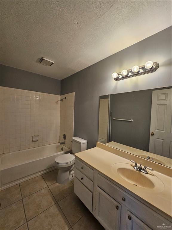 4803 Hamilton Wolfe Road, Unit 106 San Antonio, TX 78229 - Photo 11 of 18 a bathroom with a double vanity sink and a mirror
