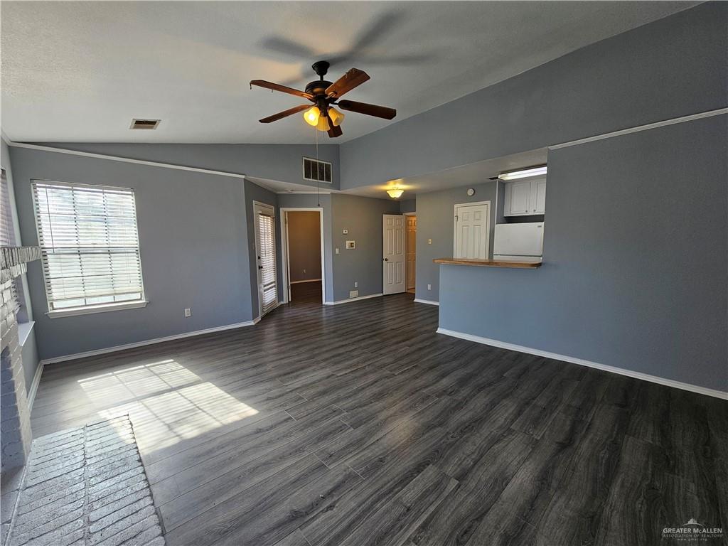 4803 Hamilton Wolfe Road, Unit 106 San Antonio, TX 78229 - Photo 2 of 18 a view of empty room with wooden floor and fan