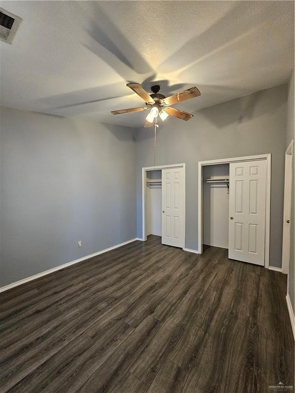 4803 Hamilton Wolfe Road, Unit 106 San Antonio, TX 78229 - Photo 9 of 18 wooden floor in an empty room
