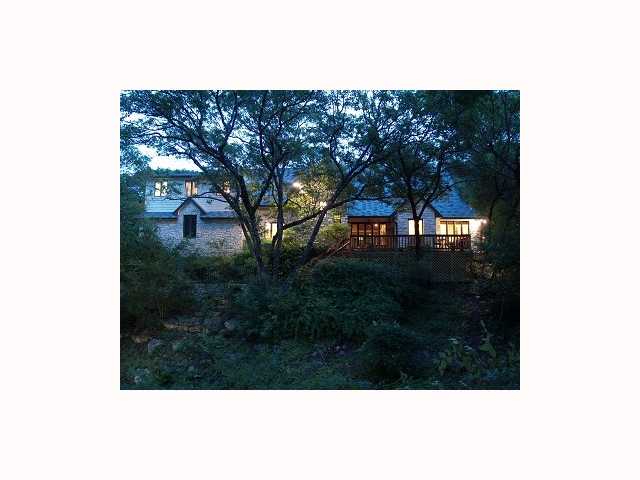 3105 Toro Canyon Road Austin, TX 78746 - Photo 1 of 1 a view of a backyard