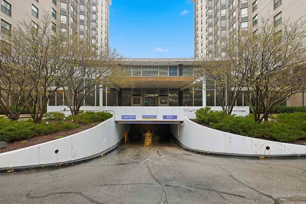 a view of outdoor sitting space and swimming pool