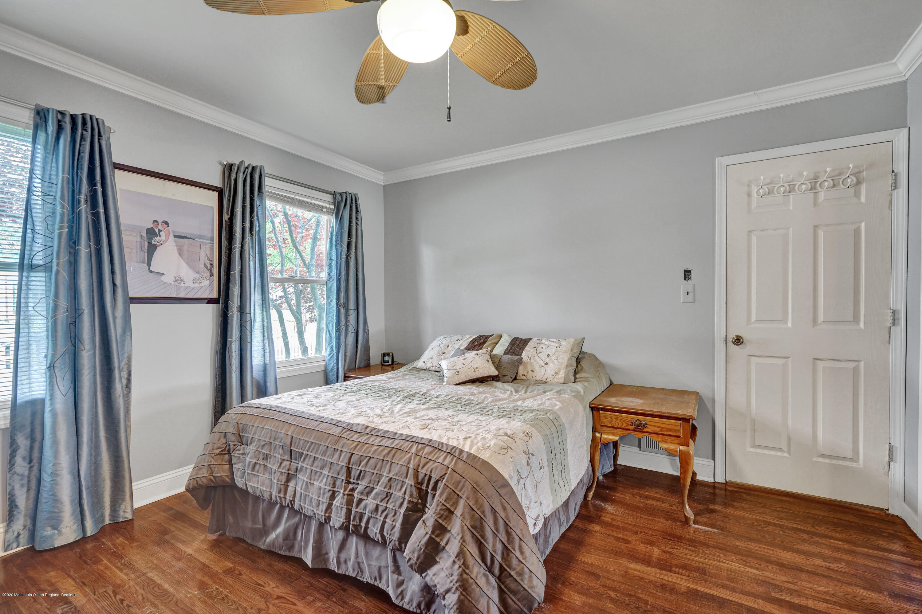 712 Midstreams Road Brick, NJ 08724 - Photo 17 of 33 a bedroom with a bed and wooden floor