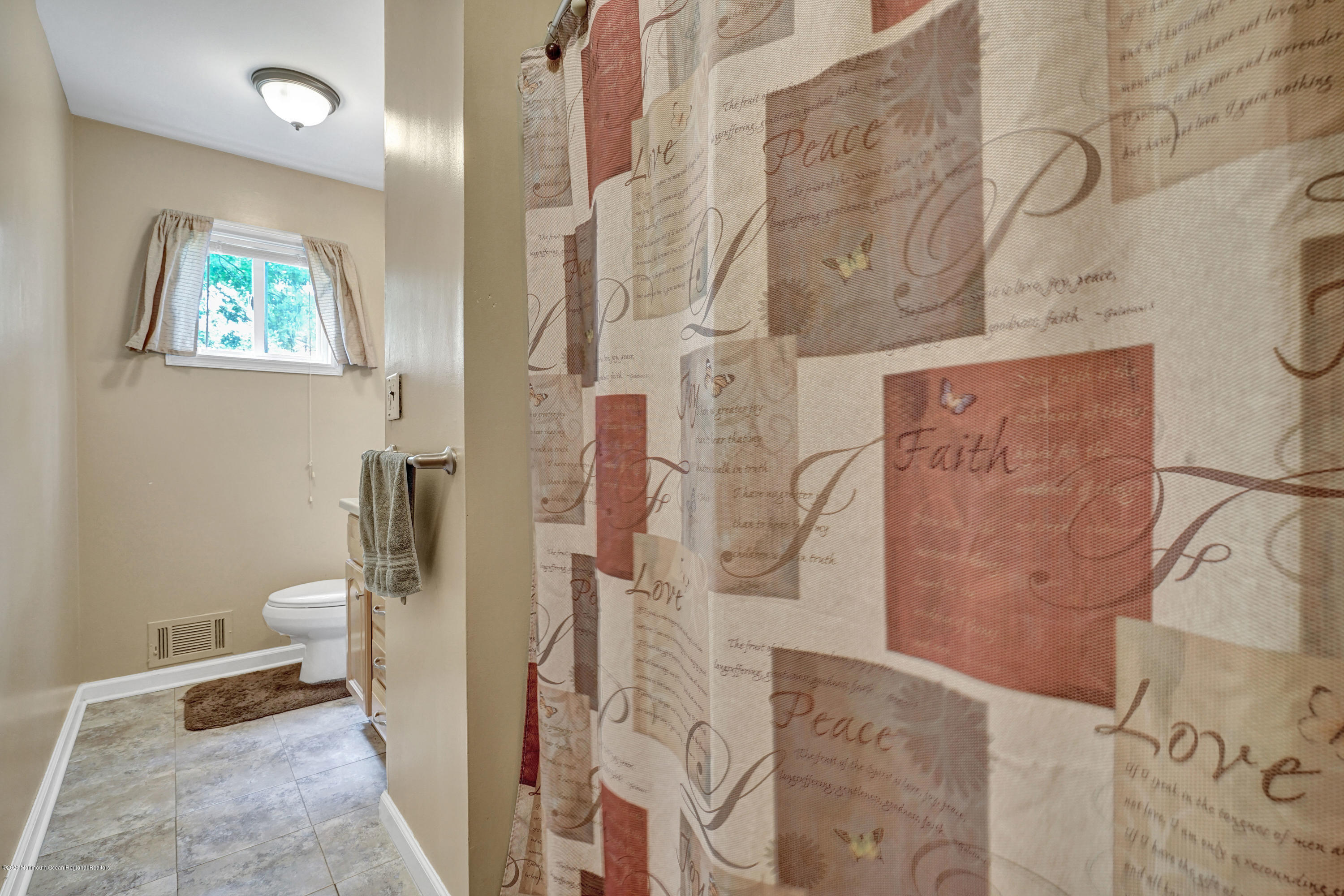 712 Midstreams Road Brick, NJ 08724 - Photo 21 of 33 a bathroom with a toilet and a shower
