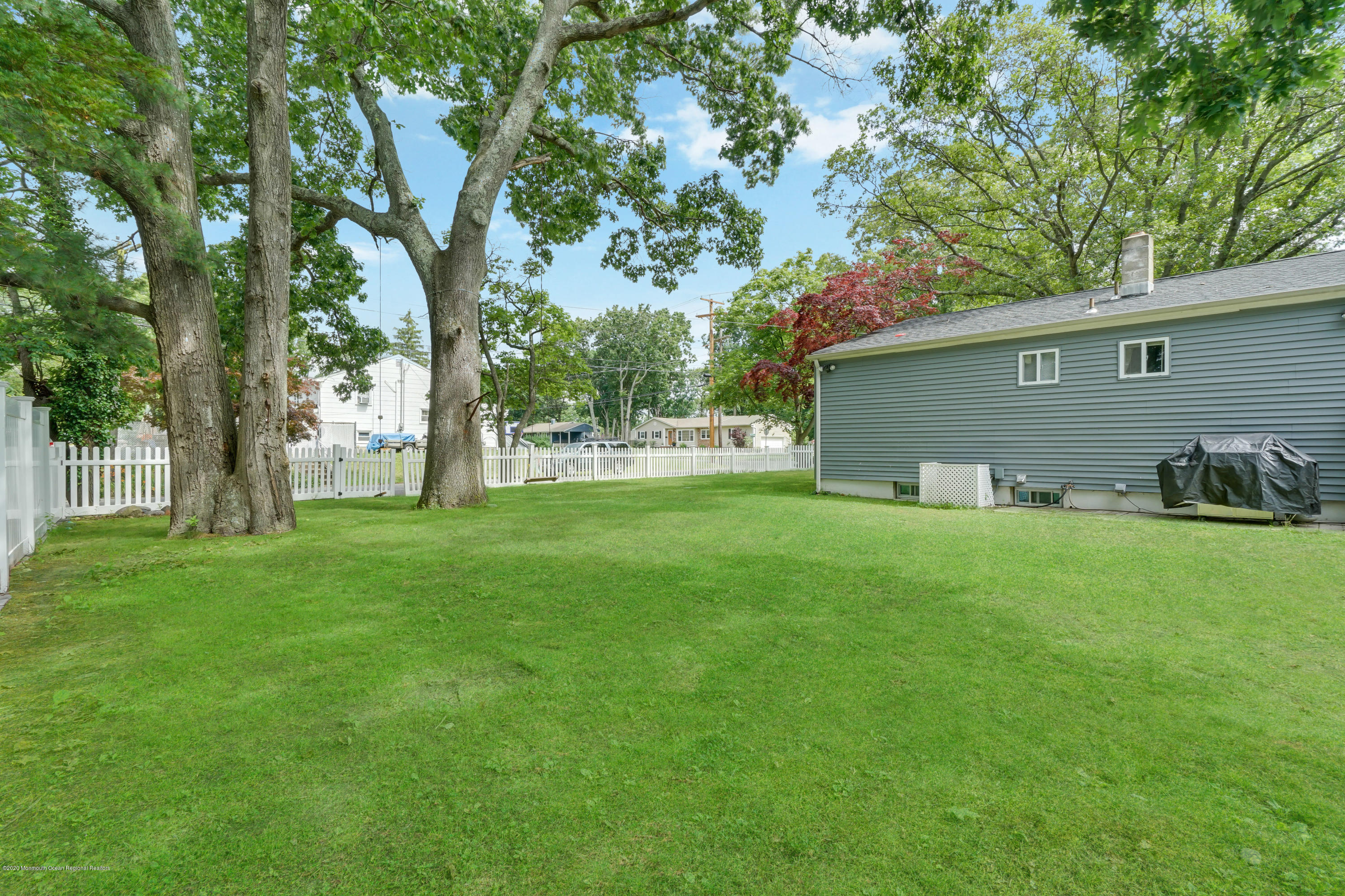 712 Midstreams Road Brick, NJ 08724 - Photo 31 of 33 a view of a backyard with large trees