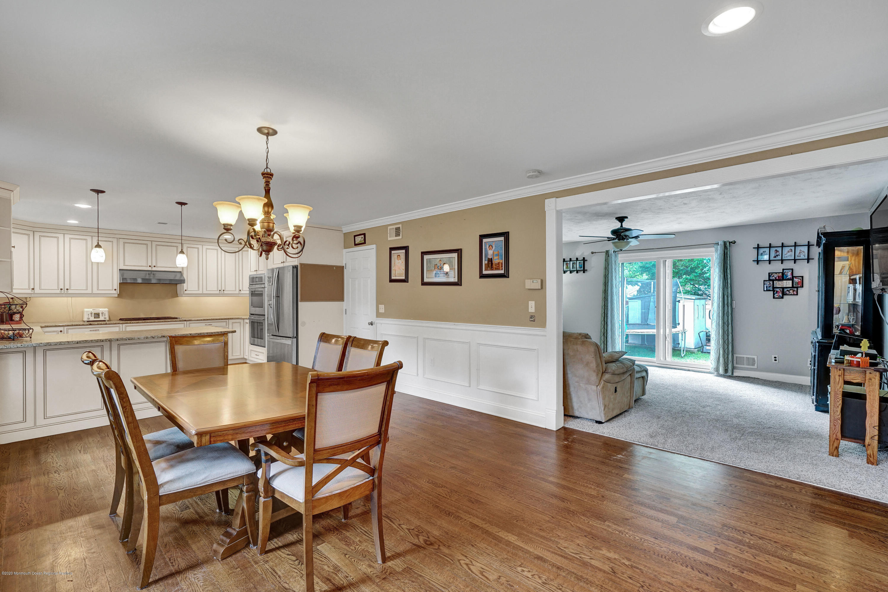 712 Midstreams Road Brick, NJ 08724 - Photo 5 of 33 a view of a dining room with furniture window and wooden floor
